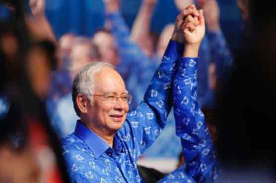 Malaysian ruling coalition wins by-election by lower margin