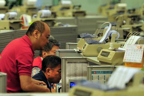 Asian shares down as Wall Street tumbles on poor data: 