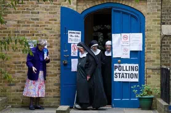 Britain holds knife-edge vote crucial for EU, Scotland