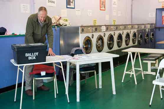 Britain holds knife-edge vote crucial for EU, Scotland