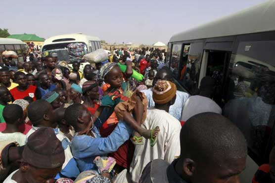 Gunman opens fire outside Nigeria school injuring 12