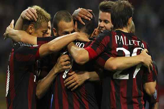 Football: AC Milan upset Roma to blow open Champions League race