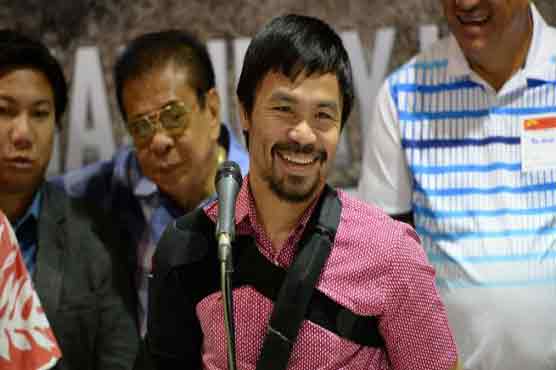 Low-key return as injured Pacquiao says retirement 'near'
