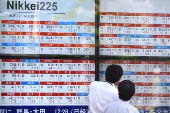Asia shares slip after US data but euro advances