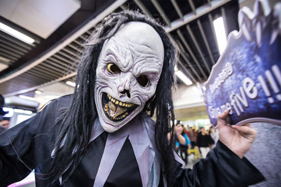 Beijing police warn 'strange outfits' on subway may cause stampedes