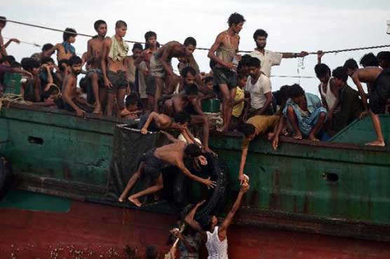 Around 700 migrants rescued off Indonesia: police