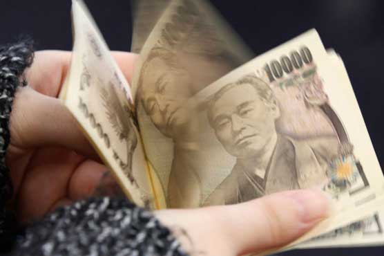 Asian markets mostly up, Euro holds gains