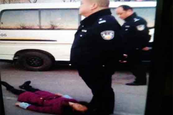 China police on trial for woman's beating death