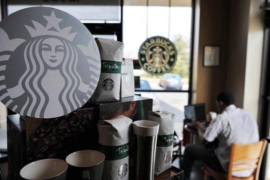 Rid of CDs, Starbucks teams up with Spotify