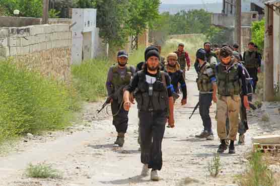 Syrian insurgents seize last military base in Idlib province