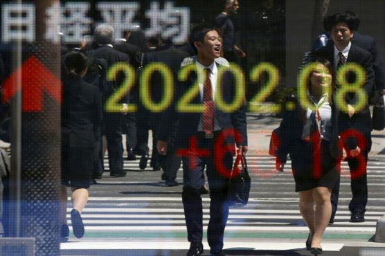 Asian shares slip, but upbeat Japan GDP lifts Nikkei