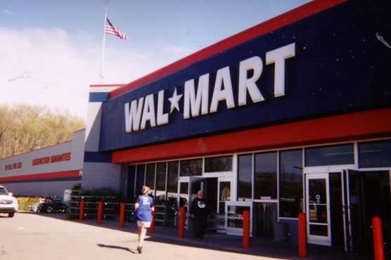 Higher costs, wages dent Walmart earnings 