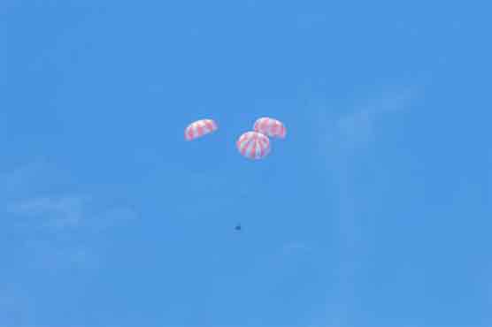 Back home on Earth: SpaceX craft returns from space station