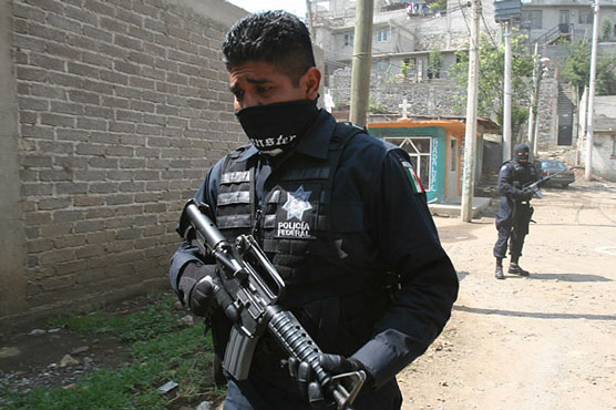 3 bodies found near Mexico city occupied by vigilantes