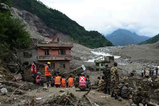Thousands flee after landslide blocks Nepal river: official