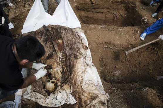 At least 139 grave sites, 28 trafficking camps found in Malaysia: police 