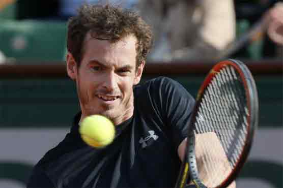 Tennis: Murray overcomes tricky conditions in opening win