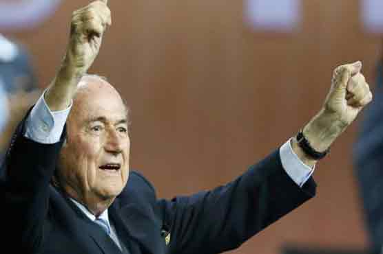 Defiant Blatter wins FIFA vote amid corruption storm