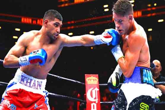 Boxing: Khan calls out Mayweather after unanimous decision win