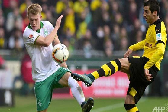 Football: Dortmund trim Bayern's lead with win at Bremen