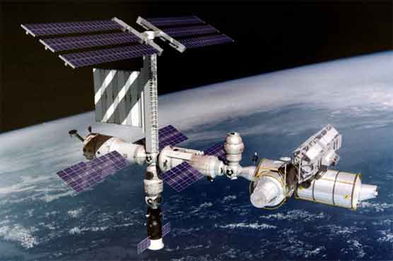 Space station marks 15 years inhabited by astronauts