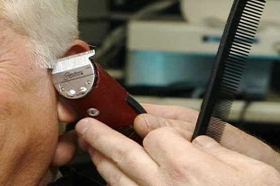 Legally blind barber awarded $100k for wrongful termination