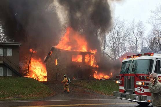 Two dead in Ohio after business jet crashes into building   
