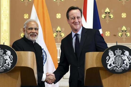 Britain, India sign over 9 billion pounds in deals despite protests