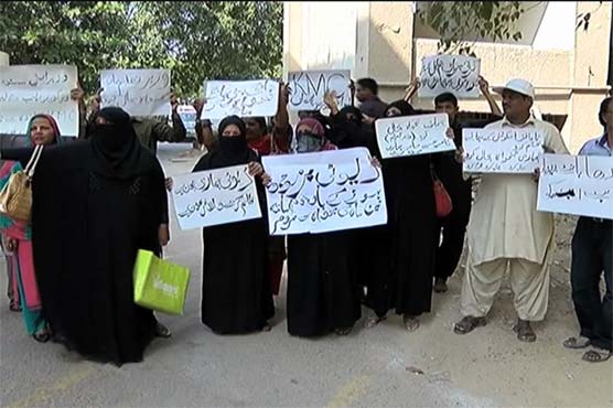 KMC teachers protest against non-payment of salaries