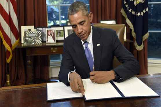 Obama signs bill making Gitmo closure tougher