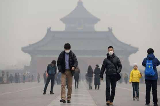 Beijing issues orange alert for heavy smog