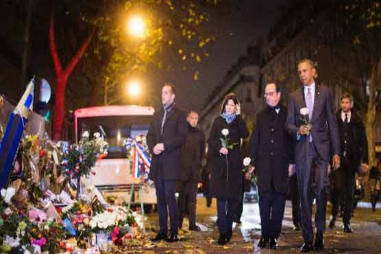 Obama pays silent tribute to Paris victims at Bataclan