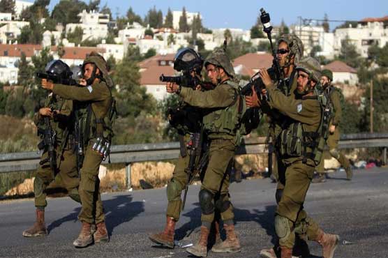 10 Palestinians wounded as Israel hunts settlers' killers