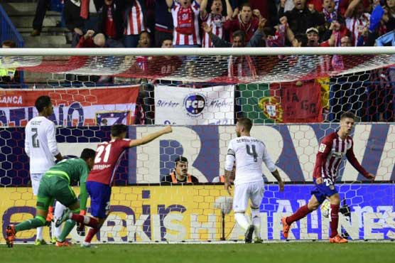 Football: Vietto leveller hands Atletico point against Real