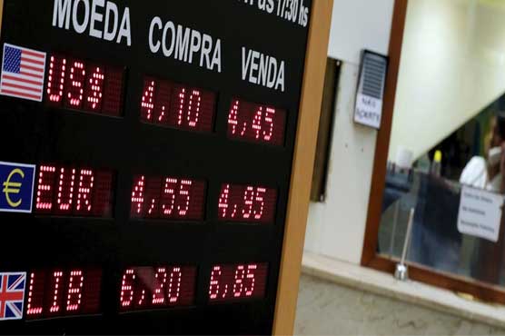 Dollar holds steady on improved risk appetite