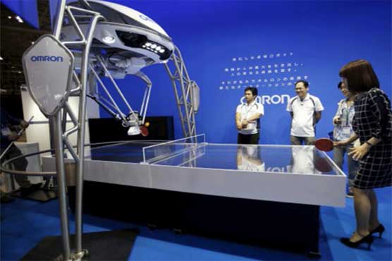 A ping pong robot & a mirror that really doesn't lie, unveiled in Japan