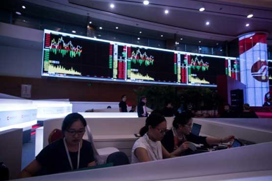 China stocks surge in Asia, Dollar retreats on Fed rate bets