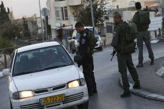 Israel sets up east Jerusalem checkpoints after violence spikes