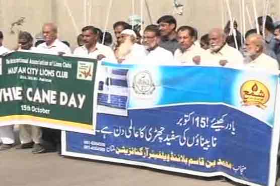Visually impaired persons hold walk in Multan on World White Cane Safety Day