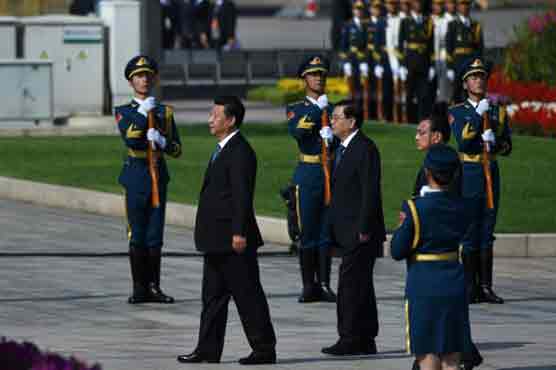 Business ties herald 'golden era' as China's Xi visits UK