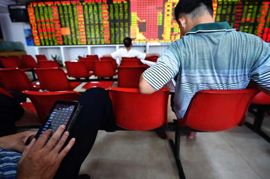 Shanghai stocks up by lunch on stimulus hopes