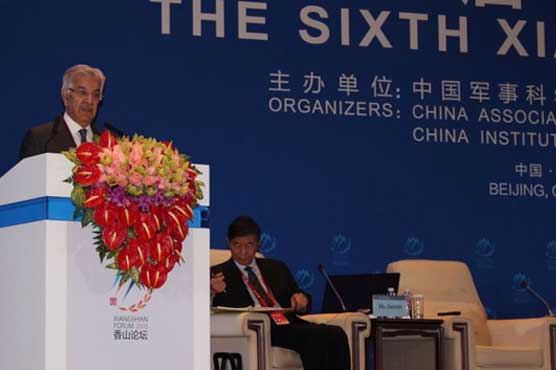 Khawaja Asif commends China's efforts for regional peace