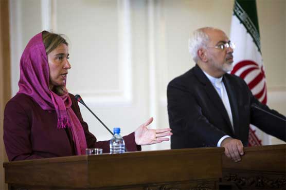 West prepares to end sanctions as Iran deal adopted 