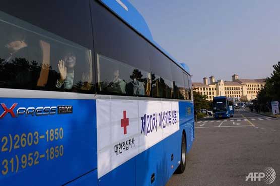 South Koreans cross into North for emotional family reunion