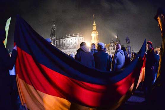 Germany's faultlines over migrants surface as thousands march in Dresden