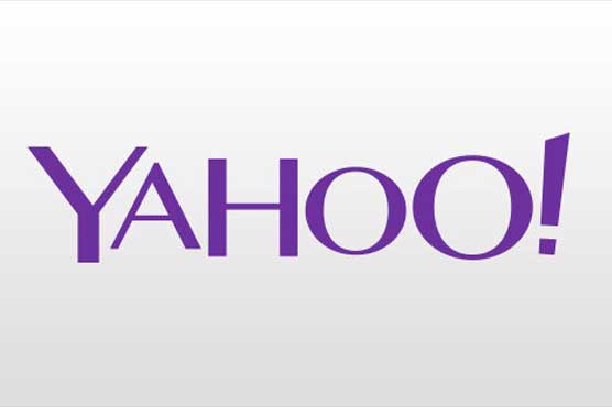 Yahoo signs ad pact with Google; earnings and revenue miss