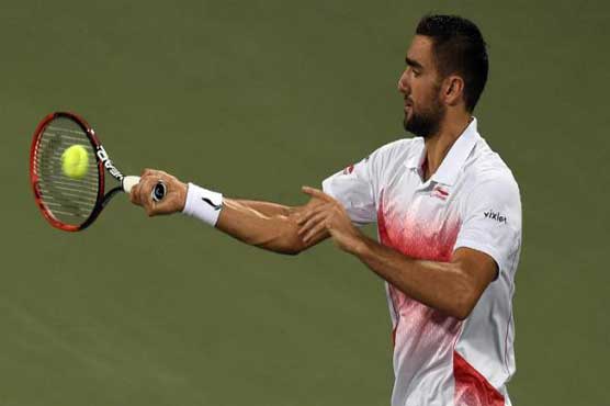 Tennis: Top seed Cilic battles into Moscow quarter-finals