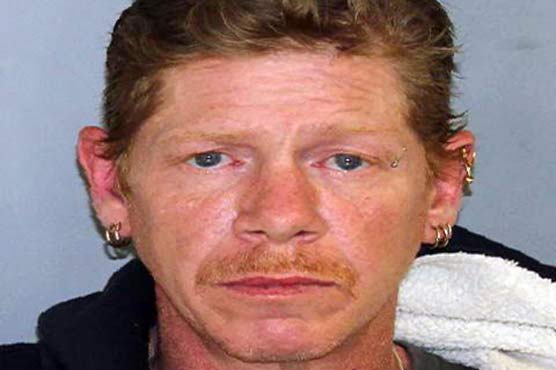 Man accused of killing mom, keeping body in motel for weeks