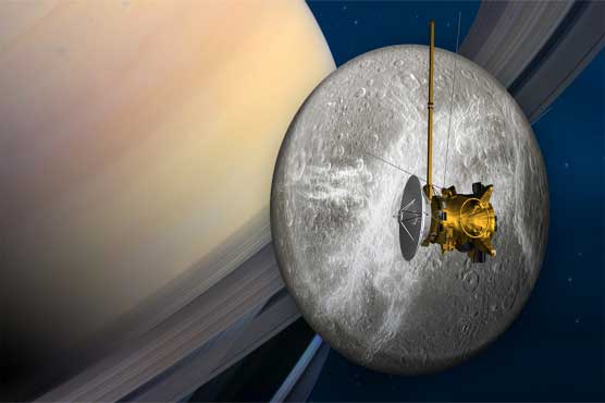 NASA spacecraft to fly through icy spray of Saturn moon