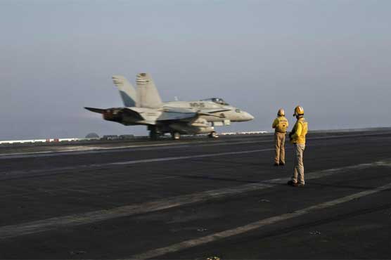 US steps up anti-IS raids, Iran invited to Syria talks